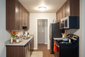 Wood/plank flooring in kitchen